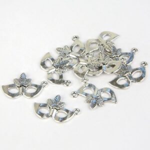 Carnival Mask Charms also known as masquerade masks in a silver metal.
