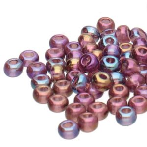 Size 8/0 Preciosa Seed Beads - Amethyst AB, a multicoloured pink, blue and gold bead