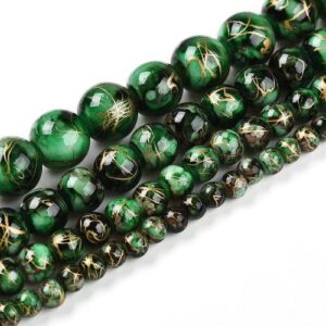 Marbled Glass Beads - Enchanted Moss. The beads come in 4 sizes as shown in the picture and are a mixture of brown, white and green with golden streaks throughout.
