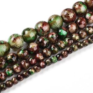 Marbled Glass Beads - Woodland Veil. The beads come in 4 sizes as shown in the picture and are a mixture of brown, white, red and green with golden streaks throughout.