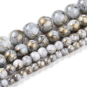 Marbled Glass Beads - Arctic Mist. The beads come in 4 sizes as shown in the picture and are a mixture of white and grey with golden streaks throughout.