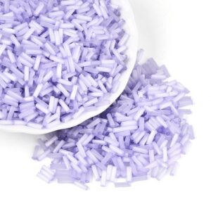 6mm Glass Bugle Beads - Lavender. These tubular beads have a hole passing through the length of the bead and are a shade of pastel.