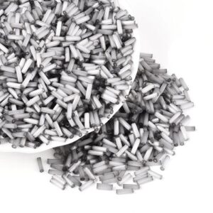 6mm Glass Bugle Beads - Grey. These tubular beads have a hole passing through the length of the bead and are a shade of pastel.